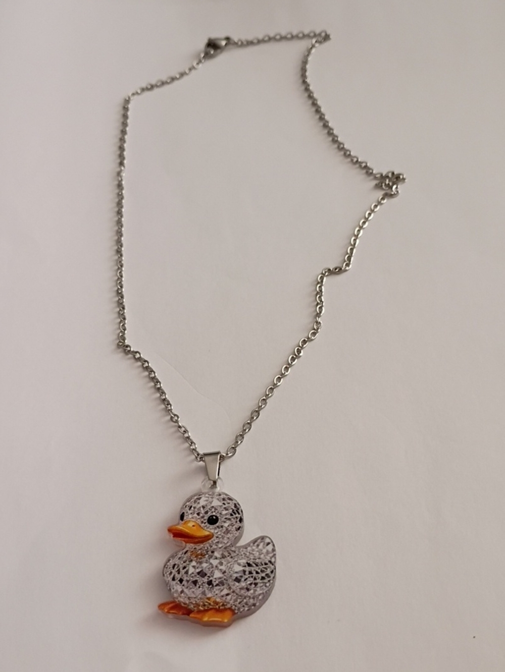 Silver Duck Pendant Necklace with Orange Beak and Feet